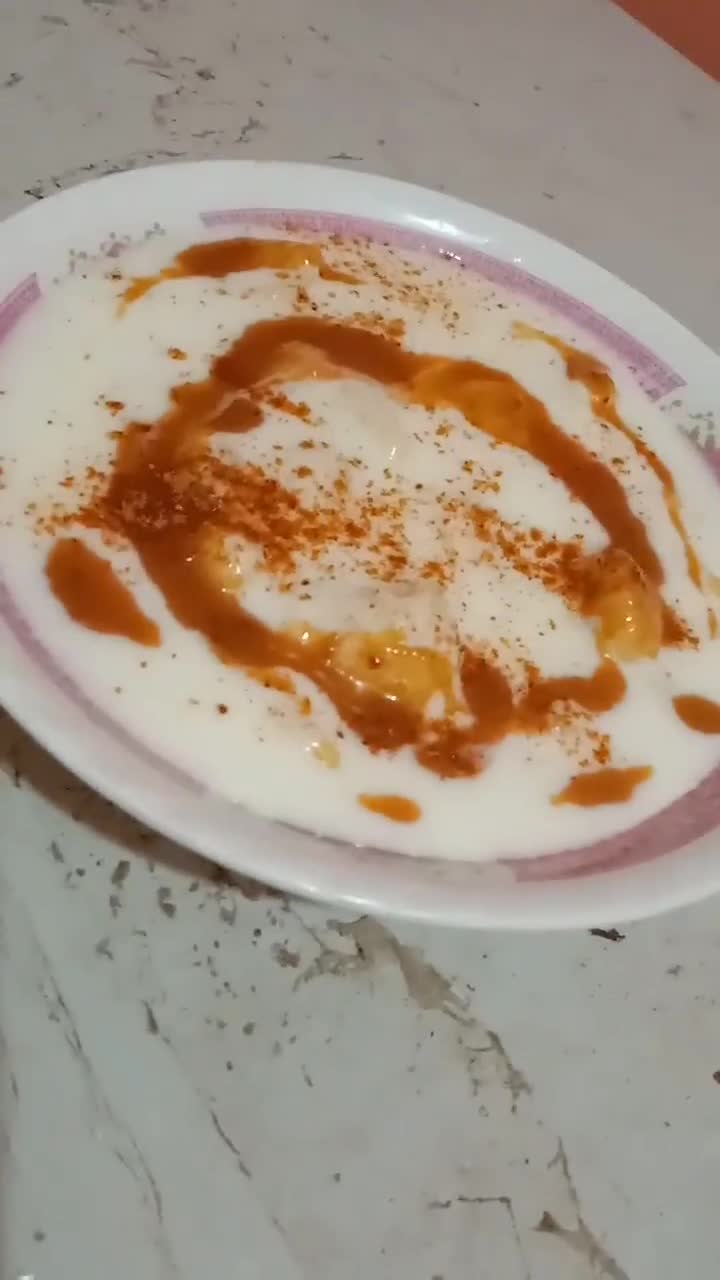 A picture of step 4 of Meethay dahi baray.
