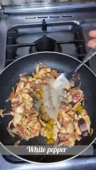 A picture of step 10 of Chicken vegetable spring rolls.