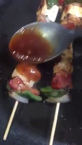 A picture of step 4 of Chicken shashlik with cottage cheese serve with fried rice.