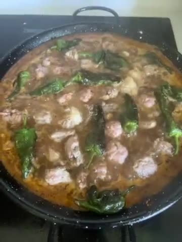 Foto del paso 9 de la receta: Paella de costillas de cerdo y butifarra