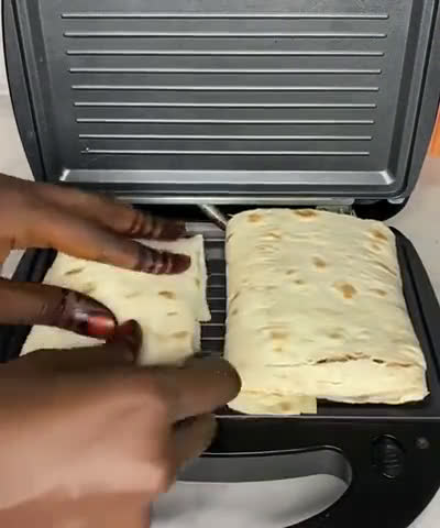A picture of step 7 of Beef tortilla wraps.