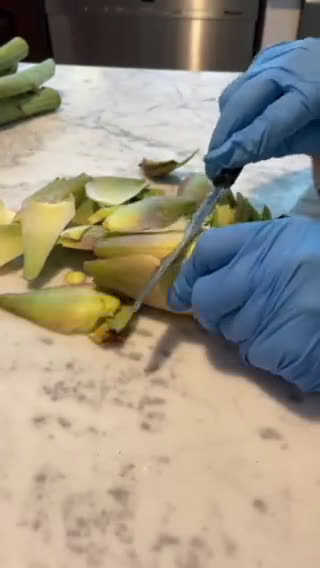 Foto del passaggio 3 della ricetta Carciofini sott’olio