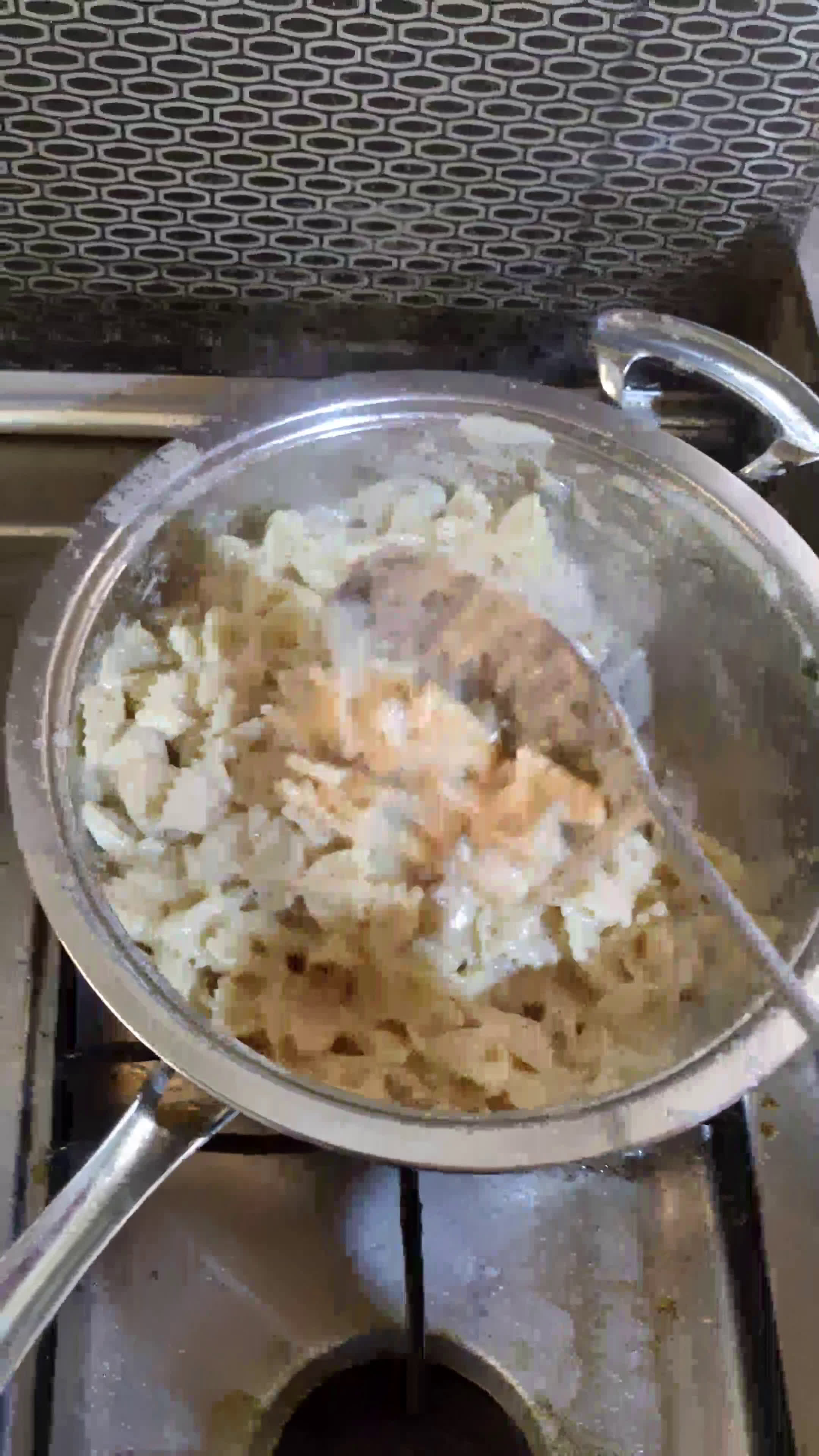 A picture of step 8 of Cajun Chicken and Farfalle Alfredo Pasta.