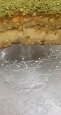 صورة لخطوة 7 من وصفة بسبوسه محشيه بالقشطه