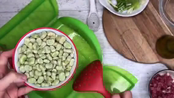 Foto del paso 3 de la receta: Habas con jamón y ajetes en Lékué al microondas