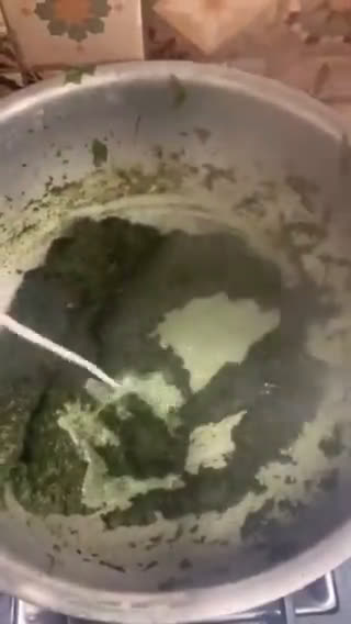 A picture of step 5 of Palak Gosht.