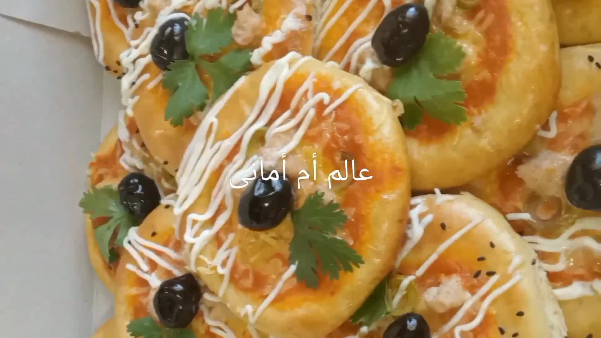 صورة لخطوة 9 من وصفة ميني بيتزا لمناسباتكم