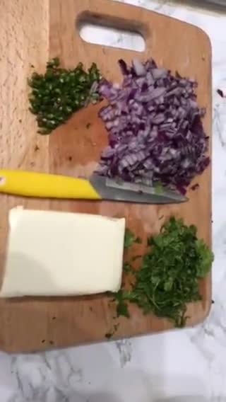 A picture of step 2 of Paneer potato paratha.