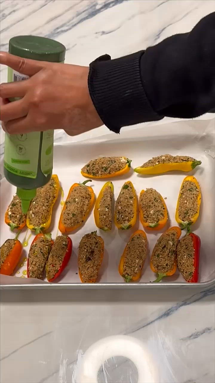 A picture of step 6 of Stuffed baby peppers with date couscous and feta.