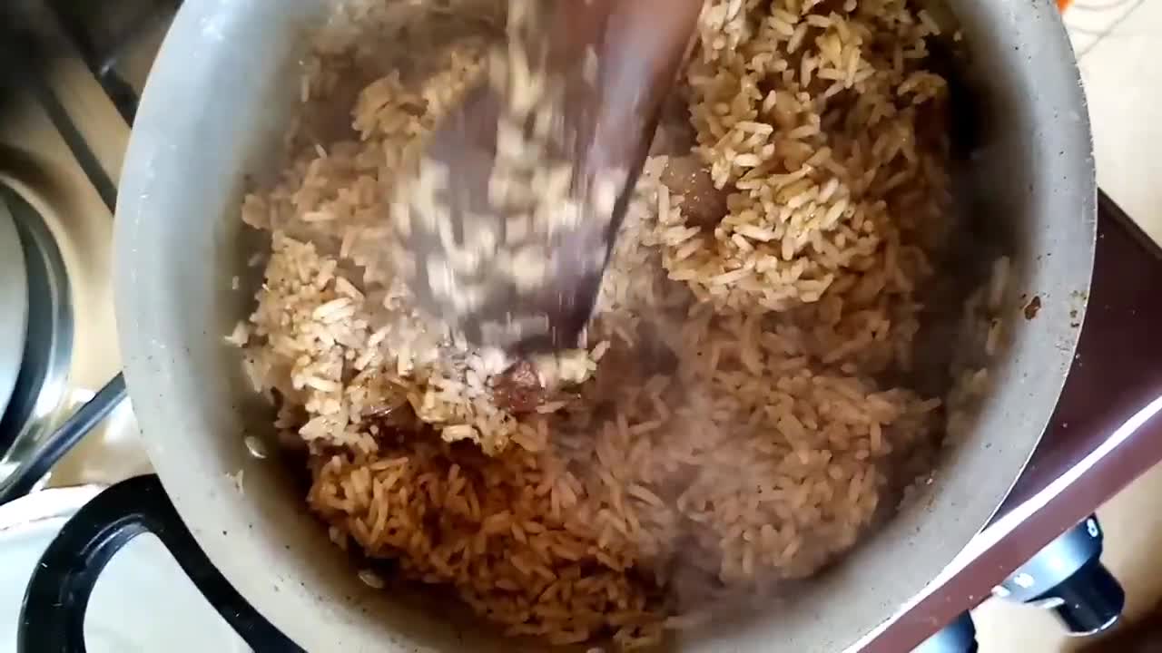 A picture of step 10 of Beef pilau.