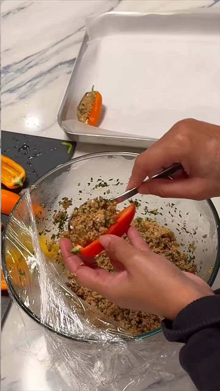 A picture of step 5 of Stuffed baby peppers with date couscous and feta.