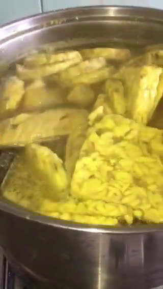 Foto langkah ke 3 dari resep Tempe goreng bumbu kuning.