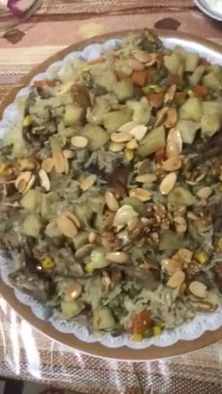 صورة لخطوة 5 من وصفة اوزي بافخاد الدجاج