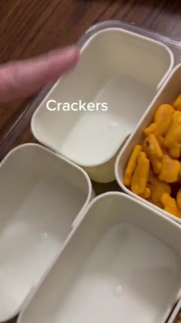 A picture of step 5 of Christmas lunchable snackle box.
