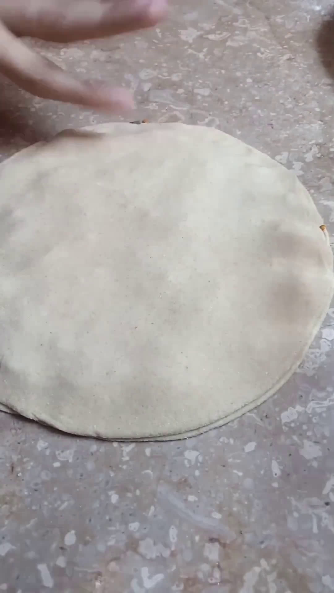 A picture of step 6 of Mooli k parathay.