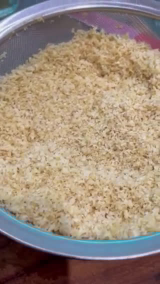 A picture of step 1 of Kibbee Busta (Baked Kibbee with onion and pine nuts).