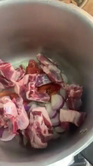 A picture of step 1 of Palak Gosht.