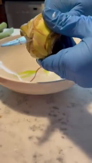 Foto del passaggio 5 della ricetta Carciofini sott’olio