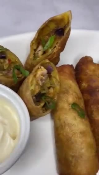A picture of step 11 of Chicken vegetable spring rolls.