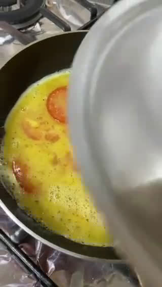 صورة لخطوة 3 من وصفة بيض بالطماطم