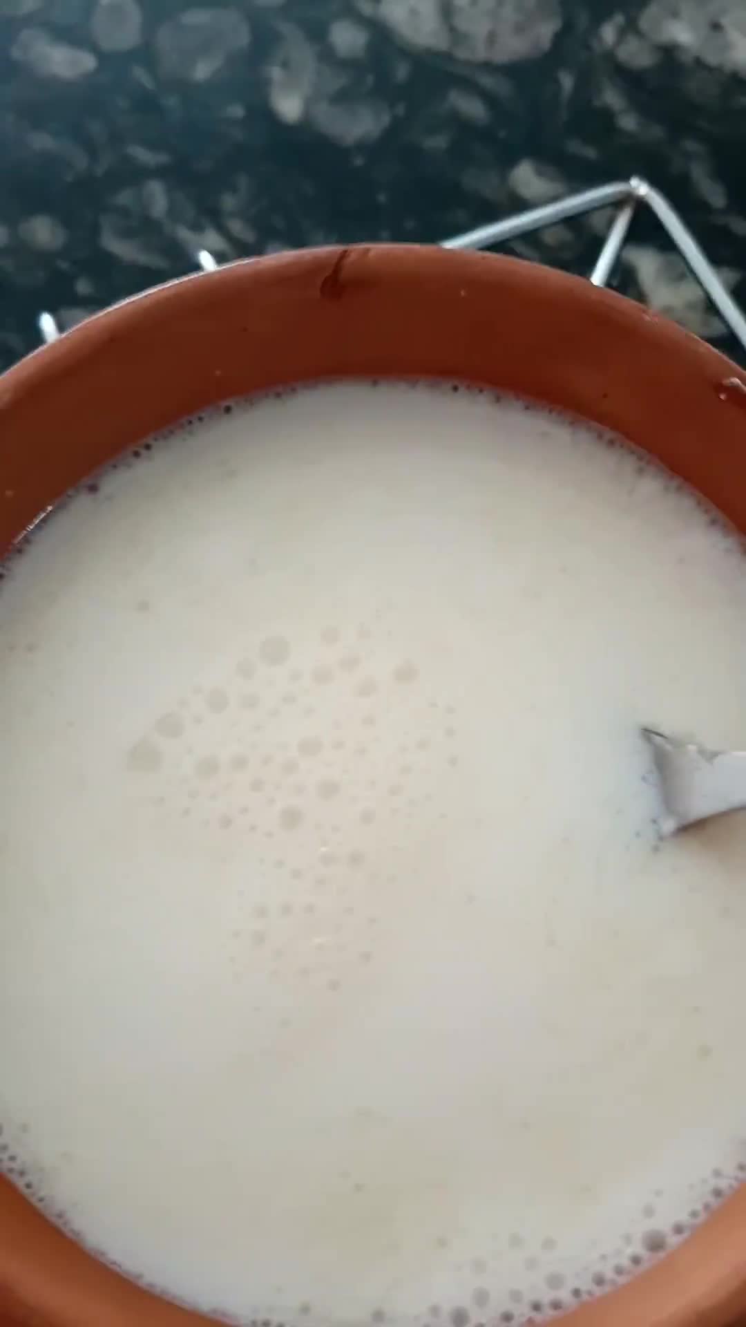 A picture of step 2 of Homemade Yogurt.