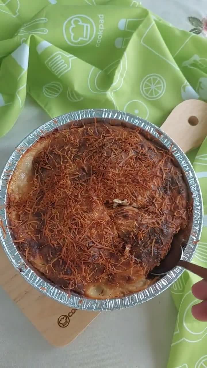 Foto langkah ke 7 dari resep Cheesy Zucchini Potato Gratin.
