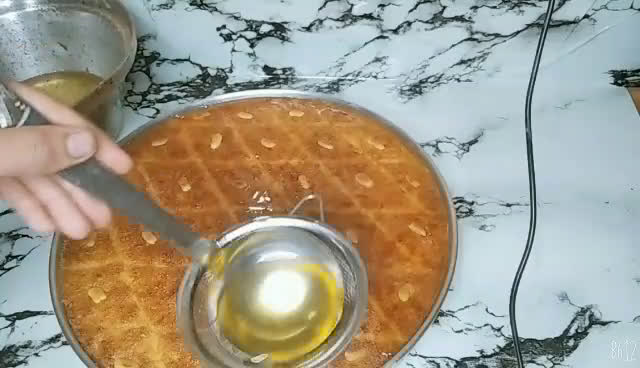 صورة لخطوة 4 من وصفة صينية بسبوسه ولا احلى من كده