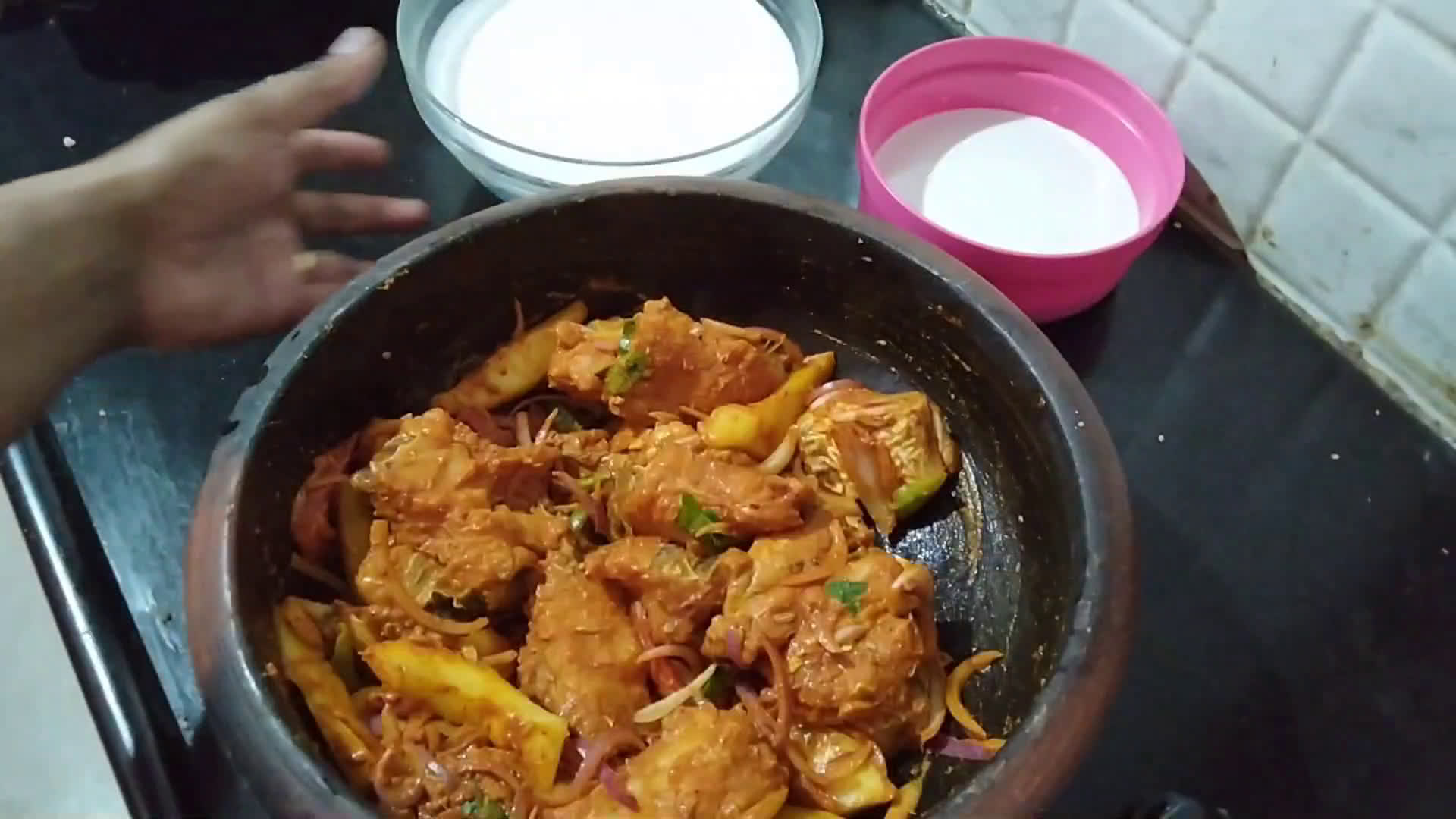 A picture of step 2 of Kerala style fish curry.