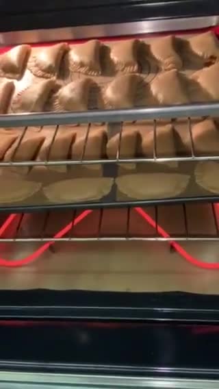 A picture of step 5 of Empanadas with Cola.