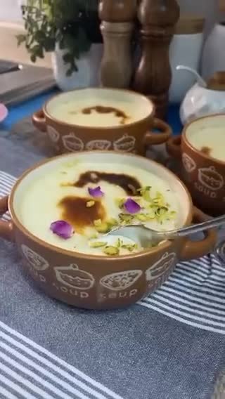 صورة لخطوة 10 من وصفة طاجن الارز بالحليب