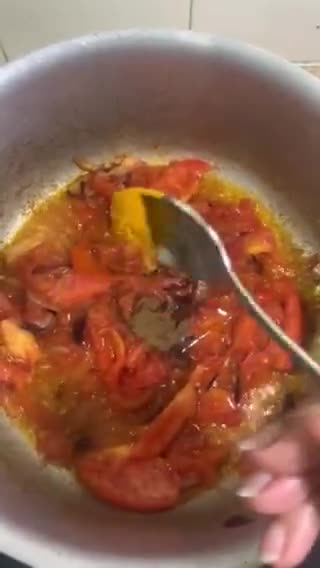 A picture of step 5 of Butter Chicken.