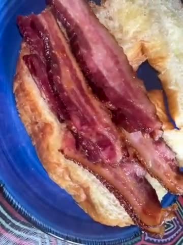 A picture of step 1 of Bacon Egg Cheese on Freshly Baked Croissant.