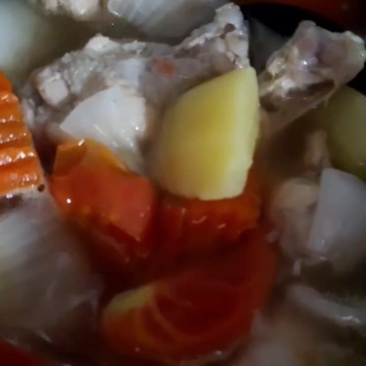 A picture of step 2 of "Chicken Soup with Potato"🐔🥔🥕🍅🧅🥣.