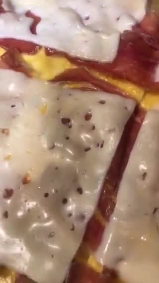 Foto del paso 6 de la receta: Rollitos de tortilla rellenos de jamón y queso