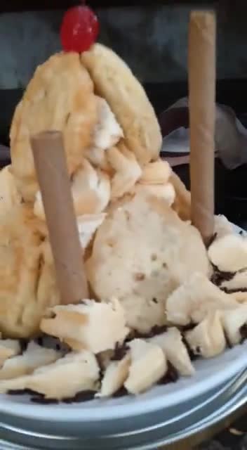 Foto langkah ke 7 dari resep Tumpeng Roti Goreng Isi Cokelat.