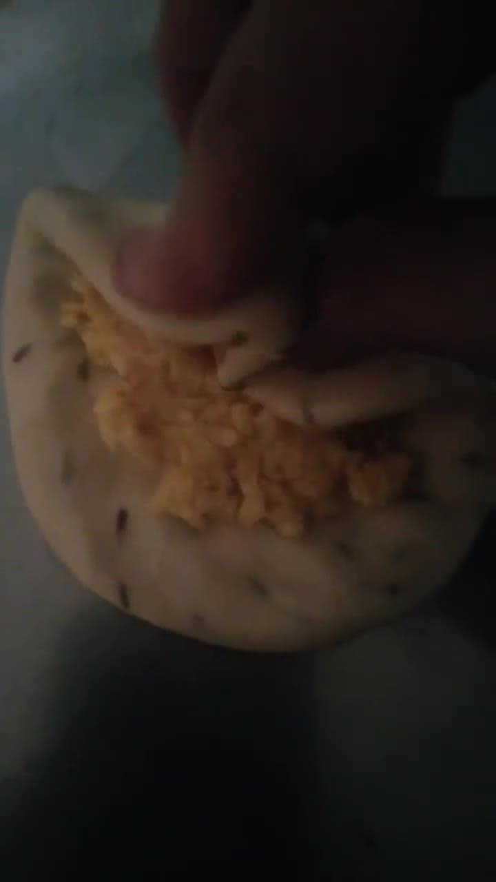 A picture of step 4 of Aloo ki tarkari daal ki kachori k saath.