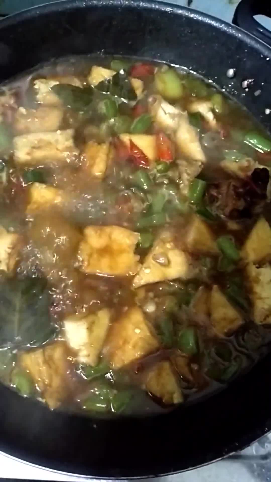 Foto langkah ke 6 dari resep Asem-Asem Daging Tahu Coklat.