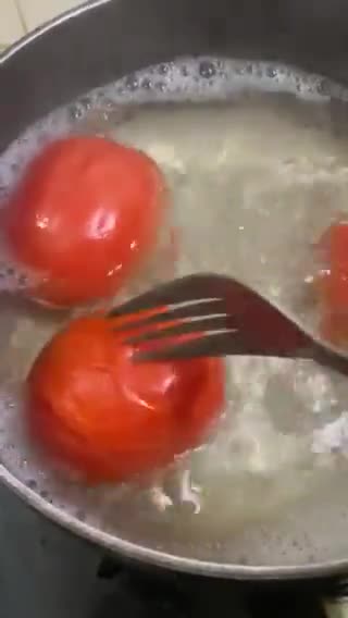 A picture of step 1 of Sweet and sour Tomato Curry serve with white rice.