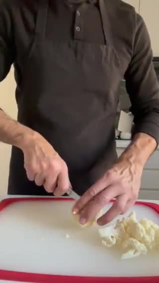 A picture of step 1 of Roasted Cauliflower with Crispy Parmesan.