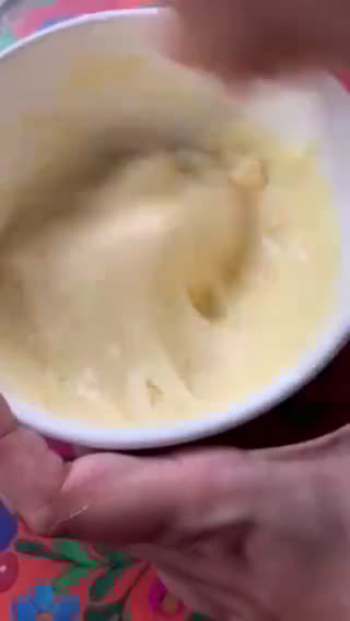 A picture of step 3 of Pancakes stack with Cherry sauce and cream cheese.