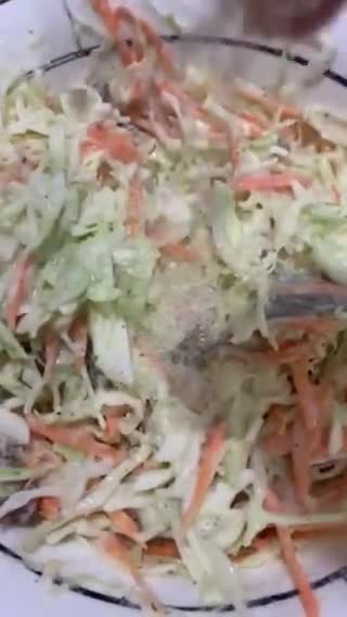 A picture of step 3 of Coleslaw with raisins.