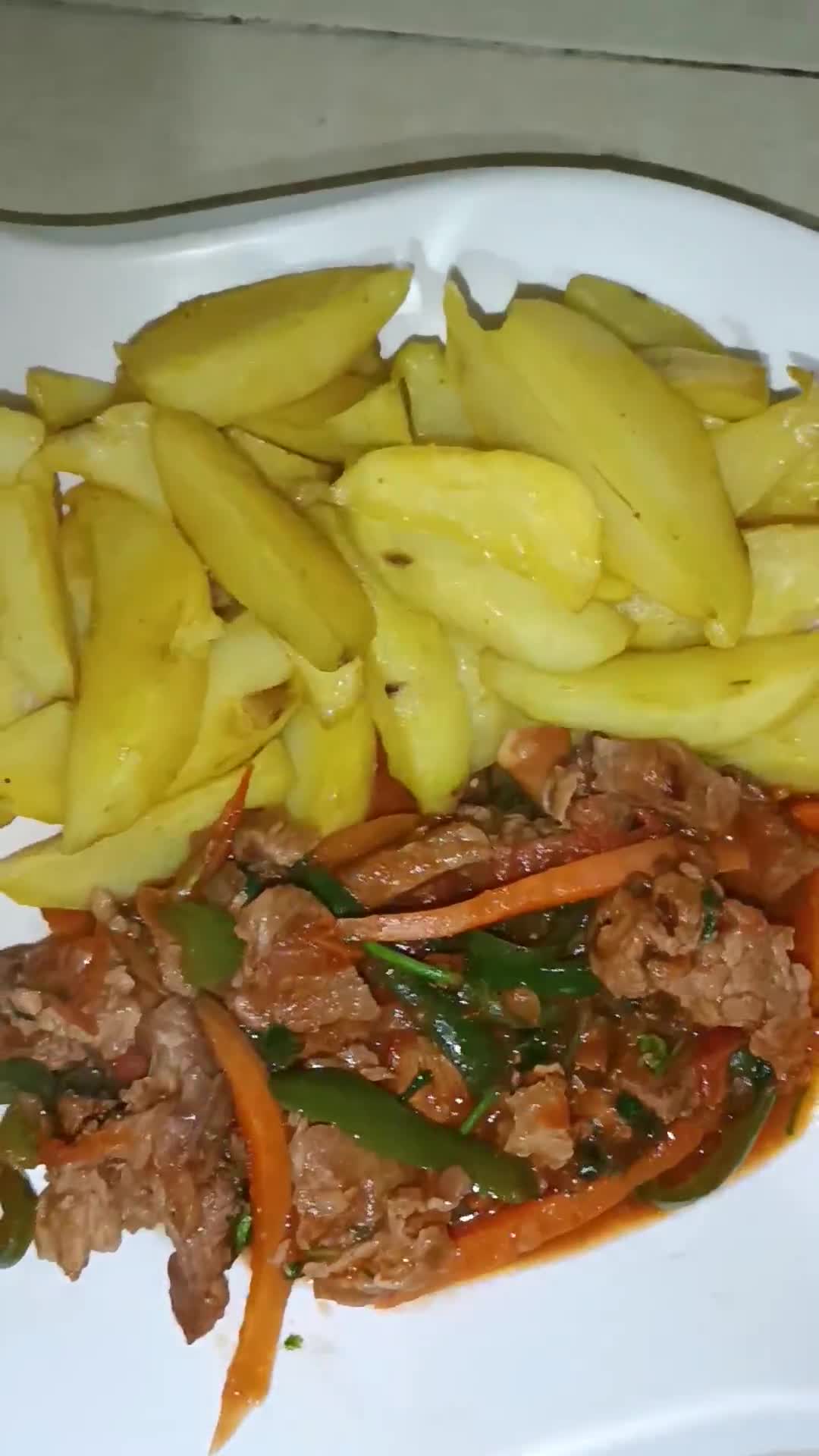 A picture of step 13 of Baked potato wedges served with beef.