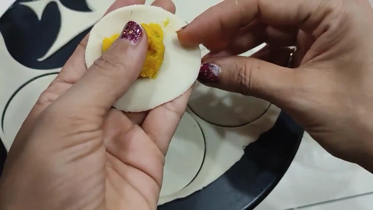 A picture of step 5 of Mango Cheese Fried Modak.
