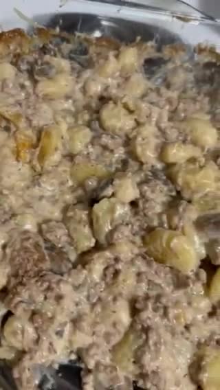 A picture of step 7 of Mushroom Swiss Burger Cassarole.