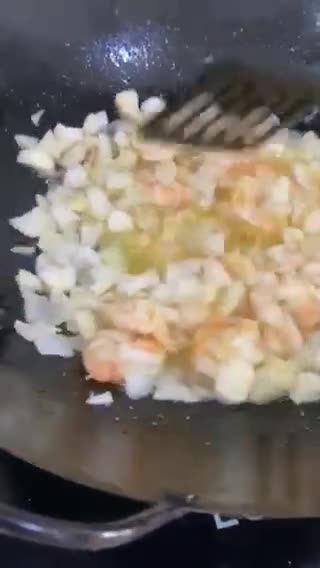 A picture of step 2 of Shrimp stir fried rice.