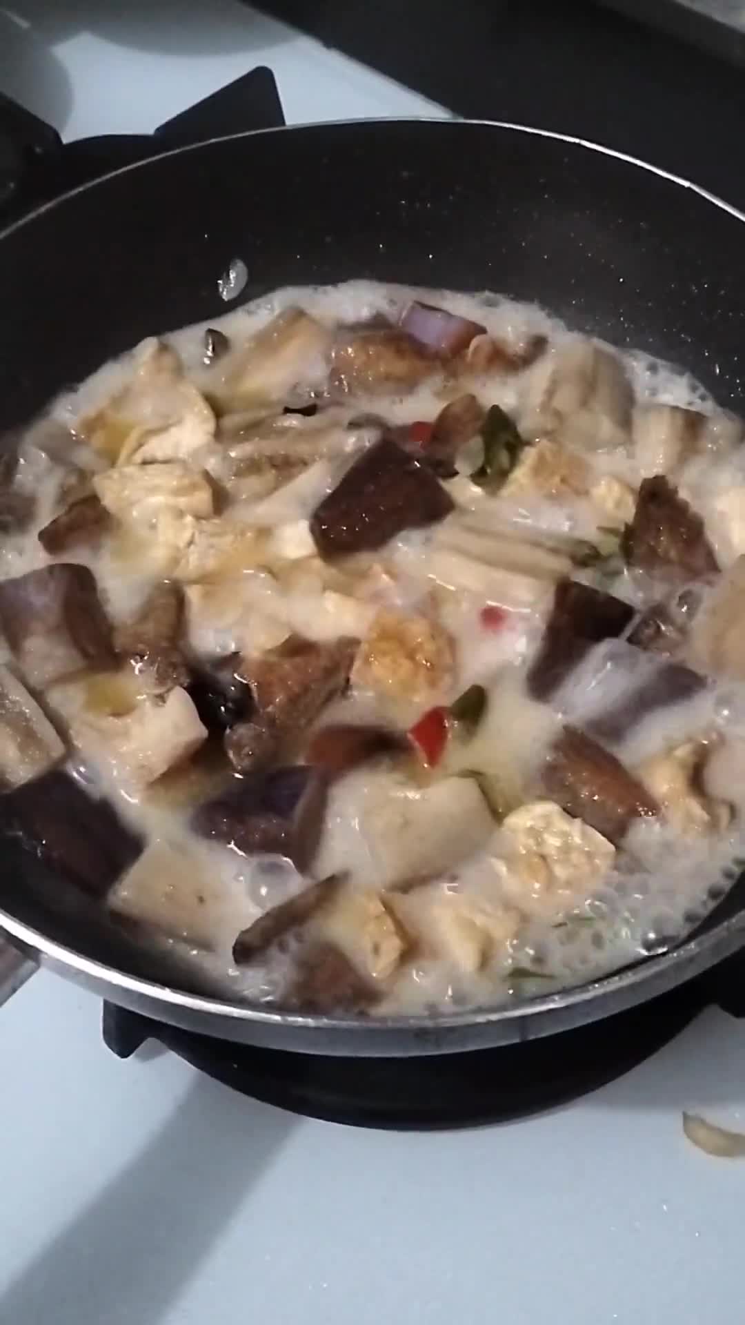 Foto langkah ke 5 dari resep Tahu Tempe Terong Santan Sepat Asin.