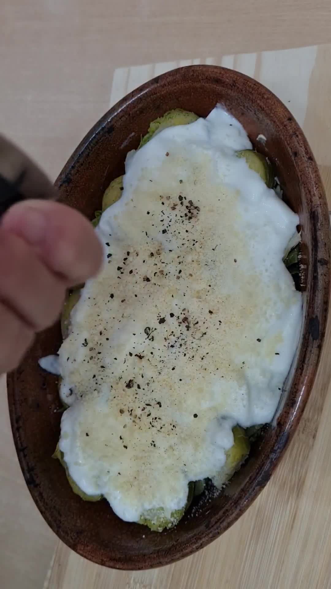 Foto del paso 3 de la receta: Repollitos de Bruselas en yogur, sobre base de avena y gratinados con queso