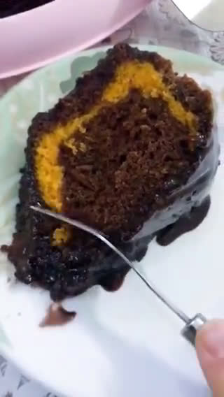 صورة لخطوة 6 من وصفة كيكة الكاكاو والبرتقال الاسفنجية 🤤😋