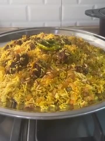 صورة لخطوة 10 من وصفة ارز بخاري باللحم
