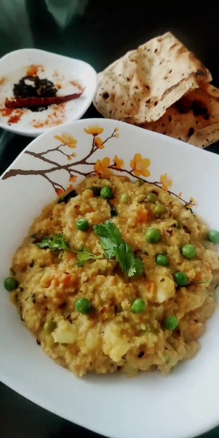 दलिया मूंग दाल खिचड़ी (daliya moong dal khichdi recipe in Hindi) रेसिपी चरण 8 फोटो